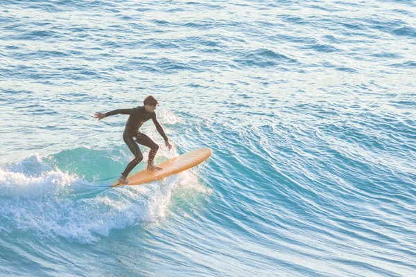 depositphotos_218269246-stock-photo-bogliasco-italy-october-2017-surfer