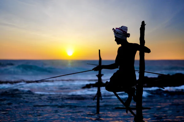 depositphotos_32942043-stock-photo-a-local-fisherman-is-fishing